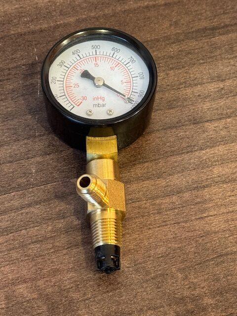 Vacuum pump gauge analogue